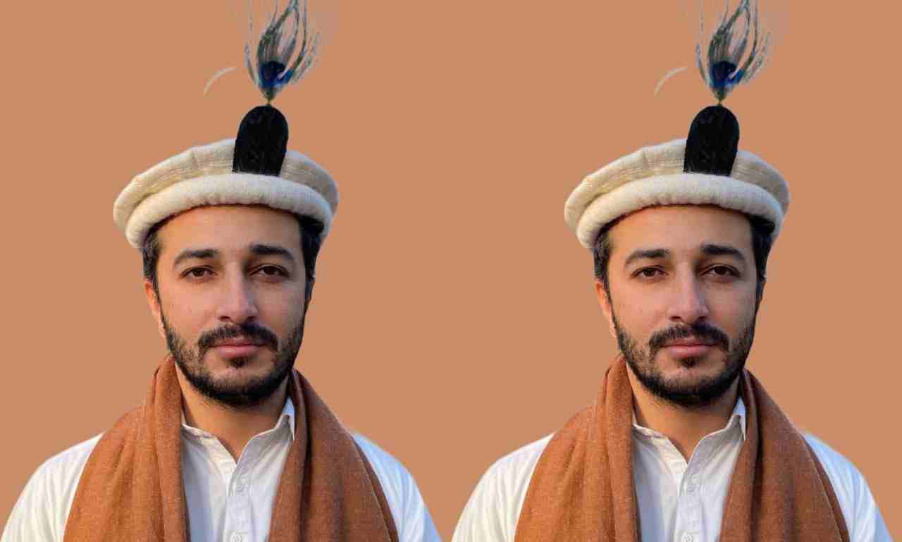 traditional gilgit cap and feather